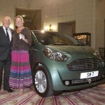 Sir Stirling Moss and Lady Moss with Aston Martin Cygnet