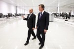 McLaren Group Chairman Ron Dennis shows UK Prime Minister David Cameron around the McLaren MP4-12C production line